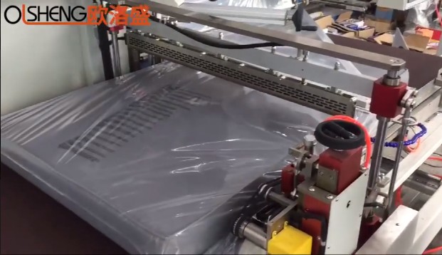 定制边封包装机包大海绵垫配膜打孔装置案例视频