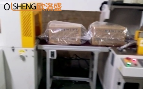 整箱干燥剂热收缩包膜机案例视频